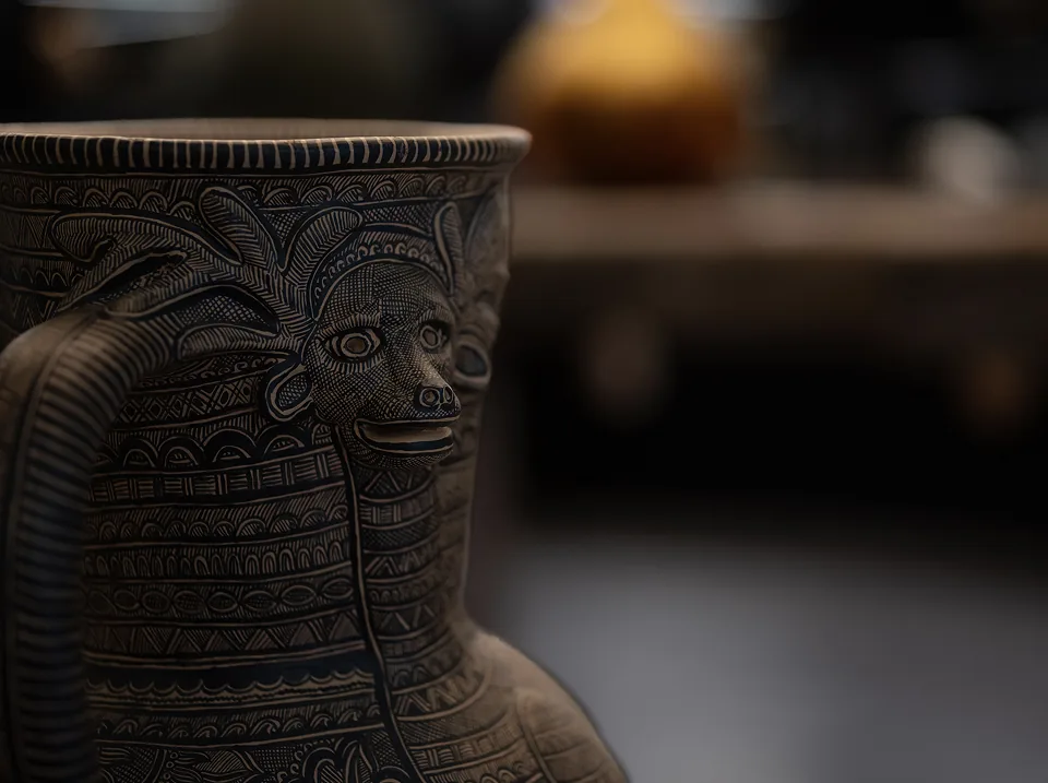 Detail of a carved Mexican craft vessel
